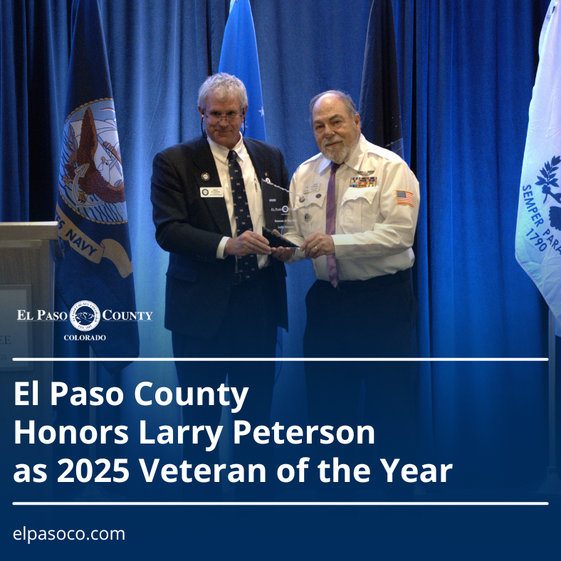 Cr Wysong stands with 2025 Veteran of the Year Larry Peterson at an award ceremony