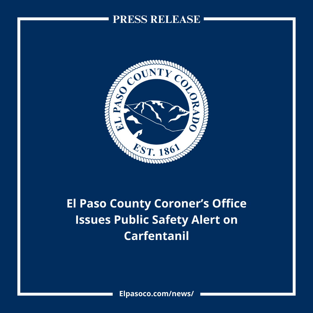 Square graphic image with blue background white El paso County logo seal and text reading El paso County Coroner's Office Issues Public Safety Alert on Carfentanil