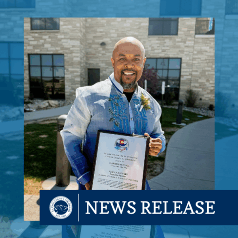 Square graphic Image of a Photo of Vernon Stewart holding his Professional of the Year award