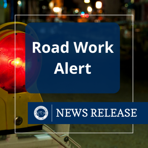 An image of a road cross light with text that reads road work alert. News release