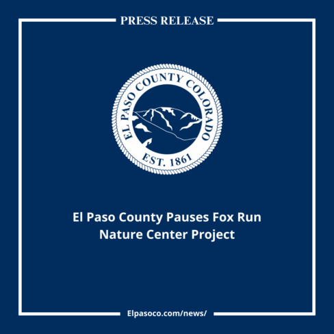 square graphic image with El Paso County seal and text reading El Paso County Pauses Fox Run Nature Center Project