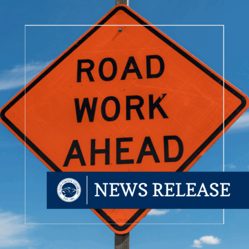 Traffic sign with text that read road work ahead