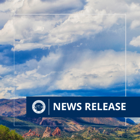 an image of a mountain and clouds