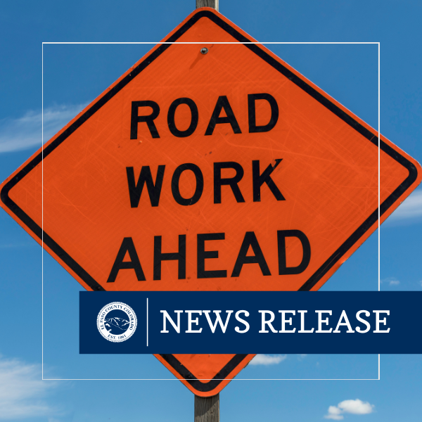 Road-Work Traffic sign with text that read road work ahead