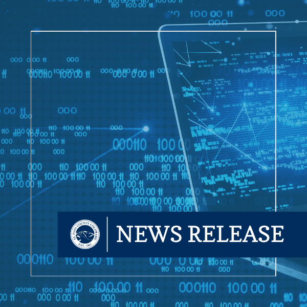 Software update square graphic image of a laptop screen and binary code 0011000011 across image with blue rectangle with text NEWS RELEASE