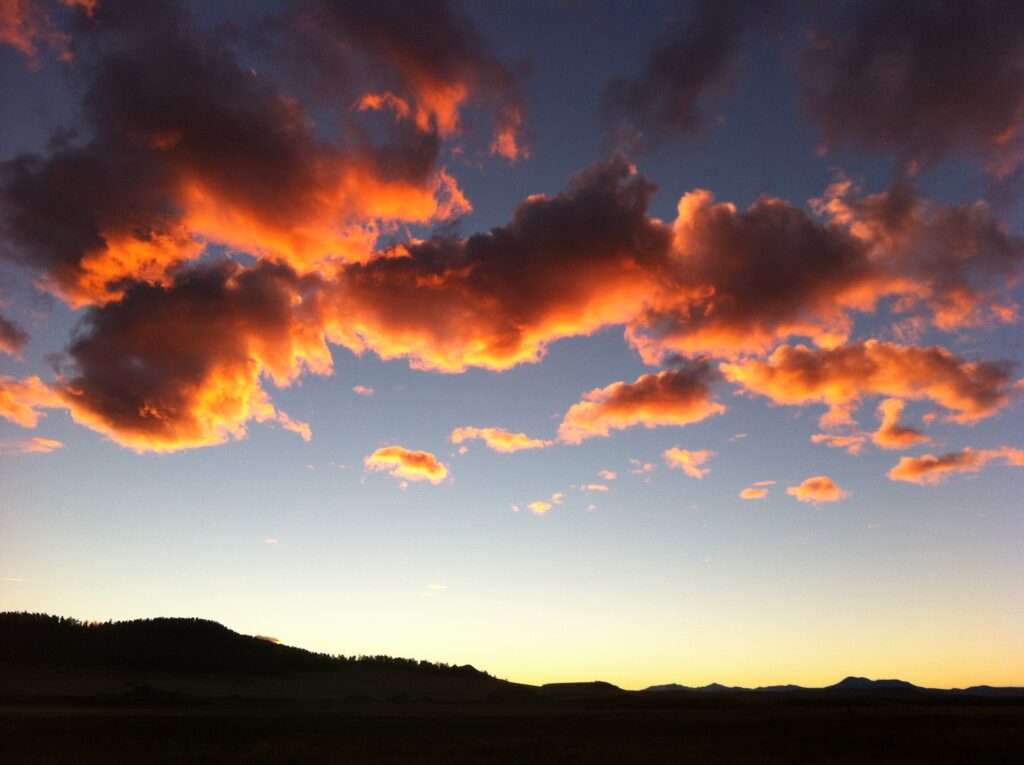IMG_8284 Sunset with dark mountains and red-golden clouds