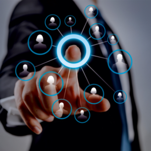person pushing a button that seems to connect to several other people as a network