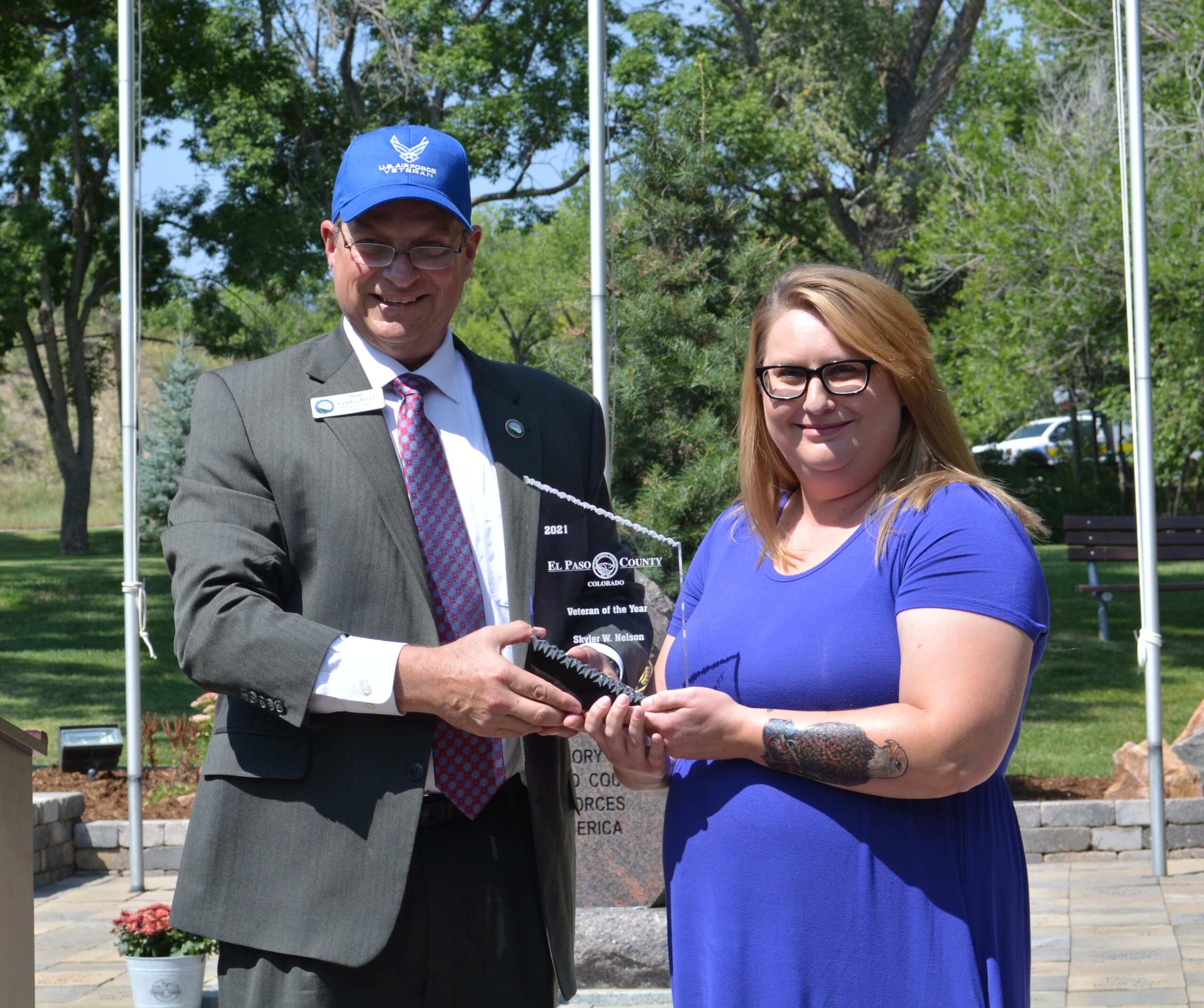 El Paso County Commissioner Stan VanderWerf presenting 2021 Veteran of the Year to Skyler Nelson