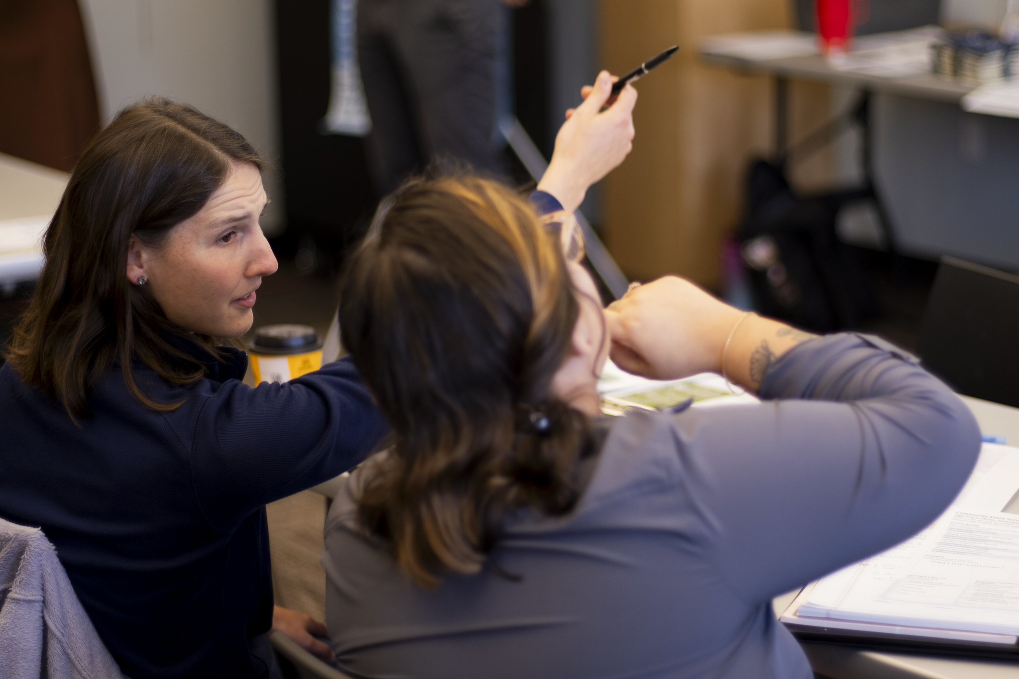 Attendees 11.7.25 Attendees engage in discussion at the November 7 community event.