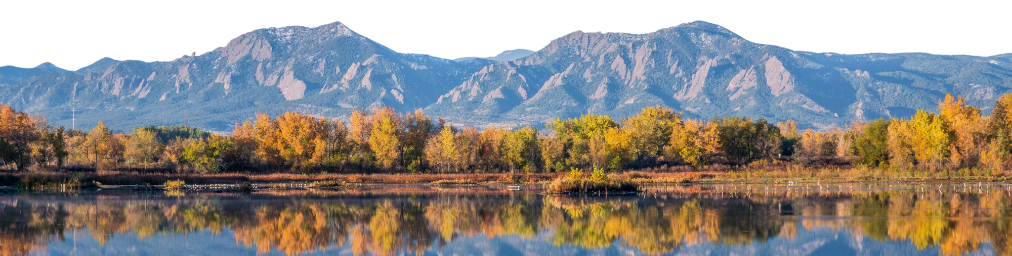 Divider_Boulder Reservoir, Colorado Boulder, Colorado Reservoir framed by fall colored trees and mountians