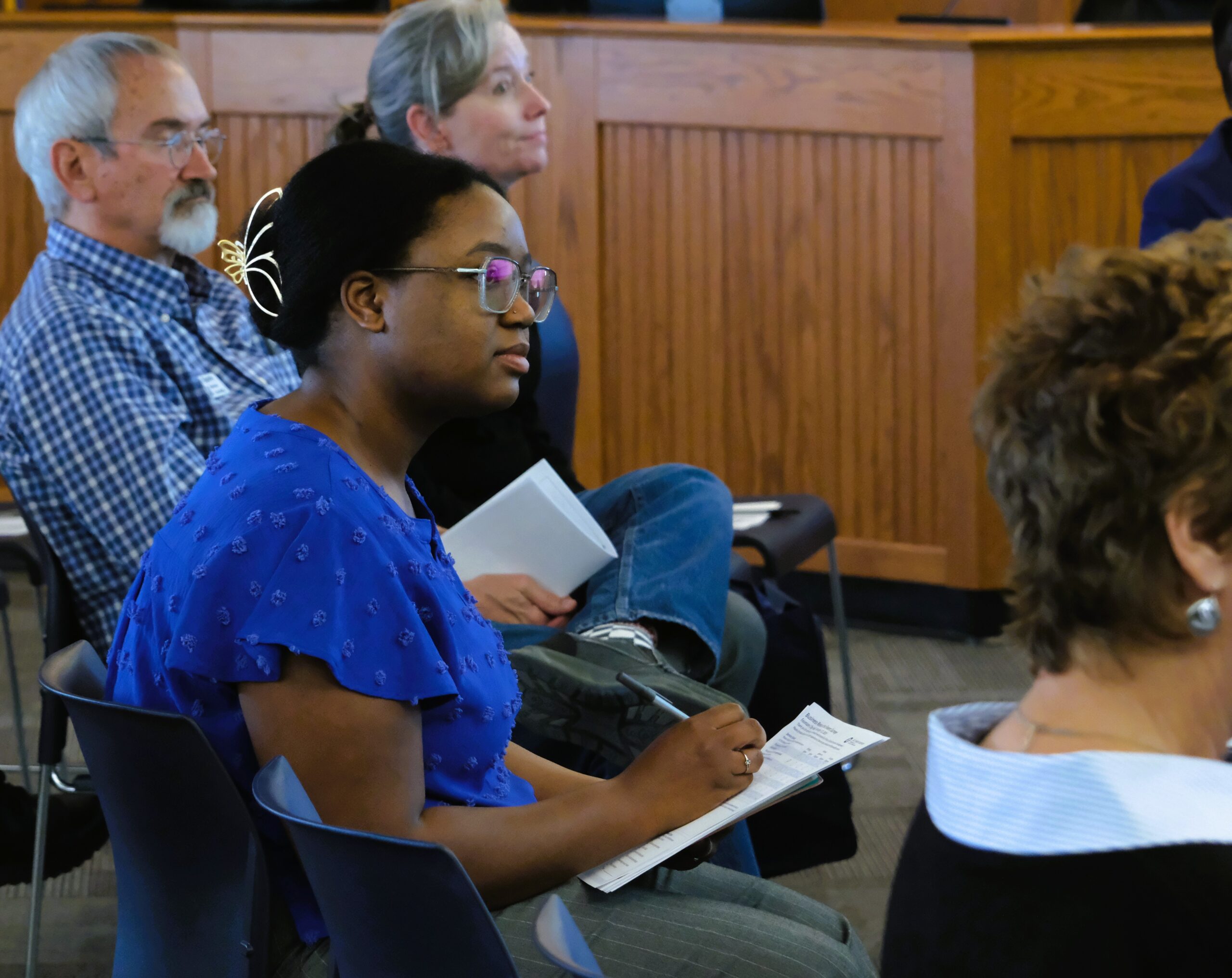 Attendees learn about business resources at the February 12 event.