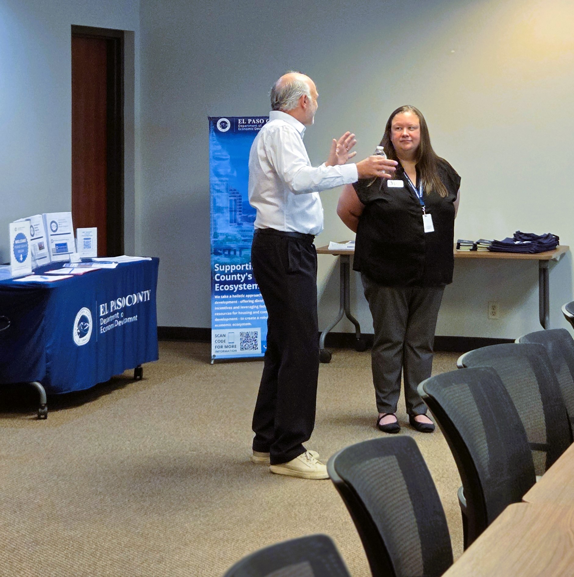 Randi Davis shares housing resources at the April 9 event.