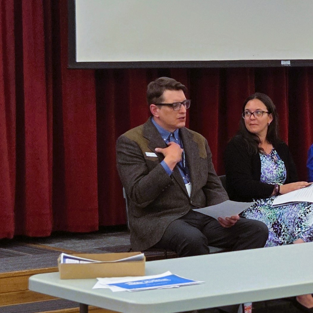 Luke Houser shares information about CDBG and local partnerships at the Community event.