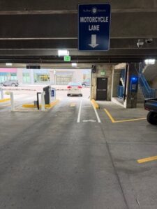 Costilla Garage Motorcycle Lane Exit Costilla Garage Motorcycle Lane Exit shown to the right of the vehicle exit lane