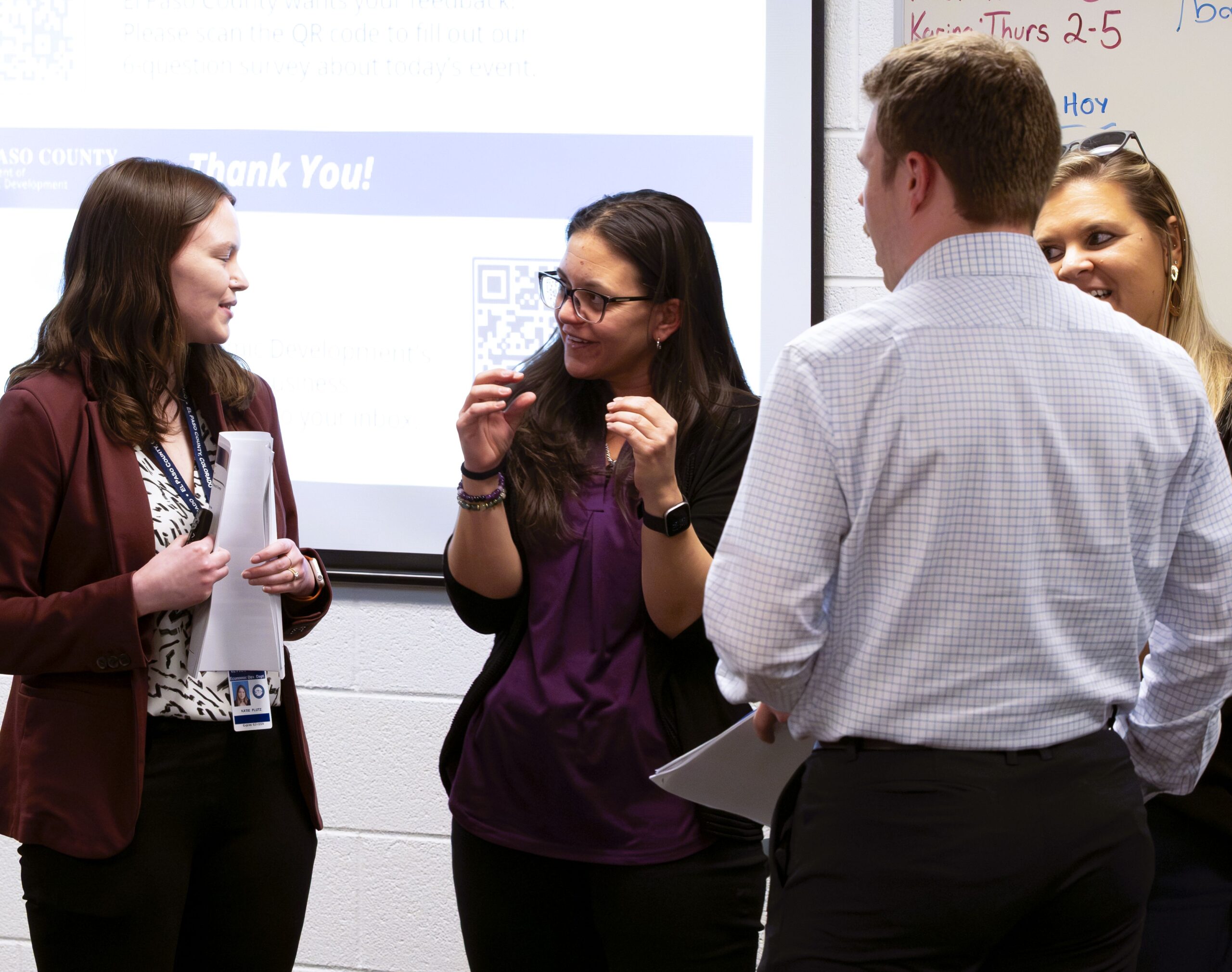 Event 11.12.25 Presenters Attendees and panelists discuss business resources at the Family Success Center.