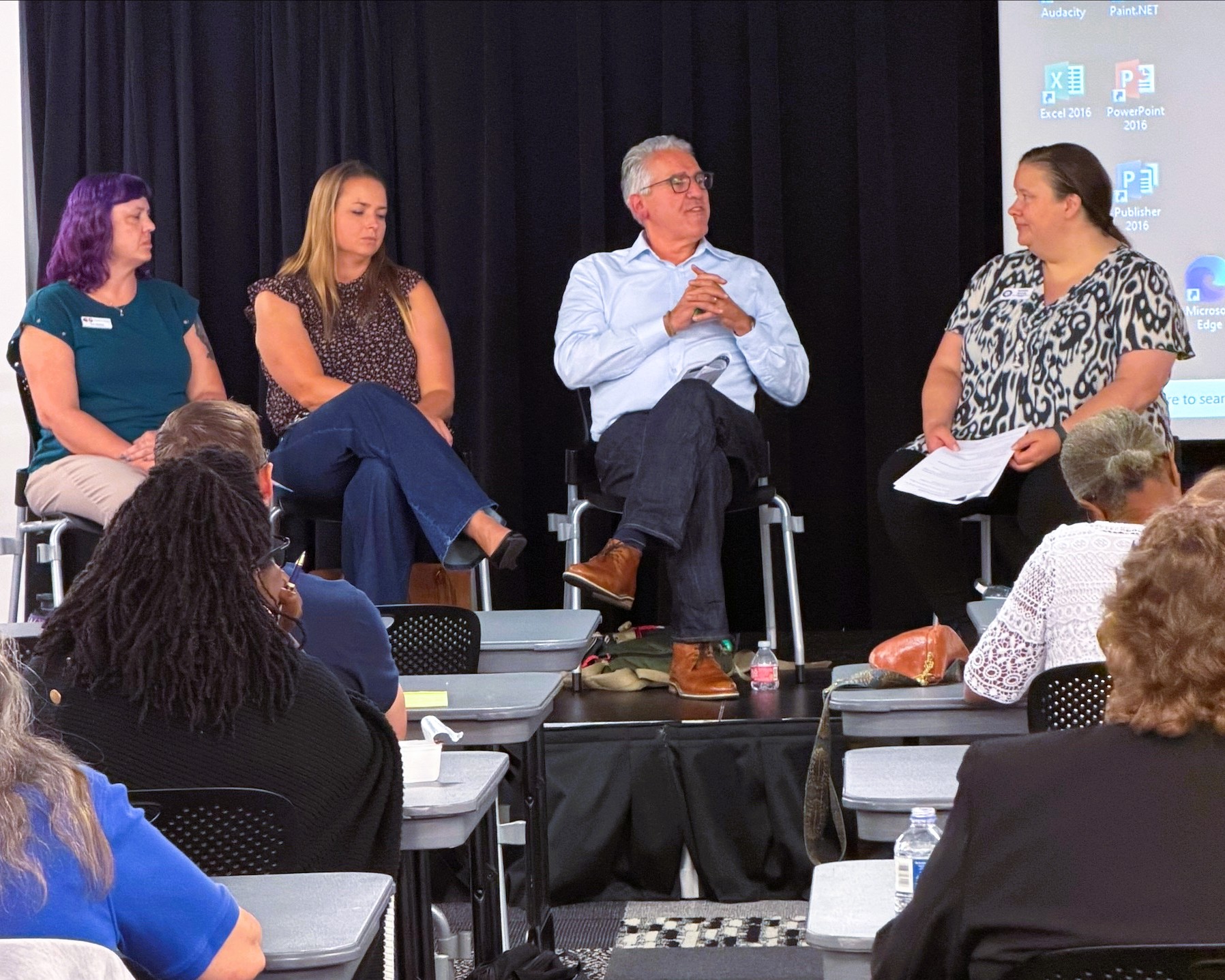 Panelists share expertise and answer questions at the El Paso County housing event.