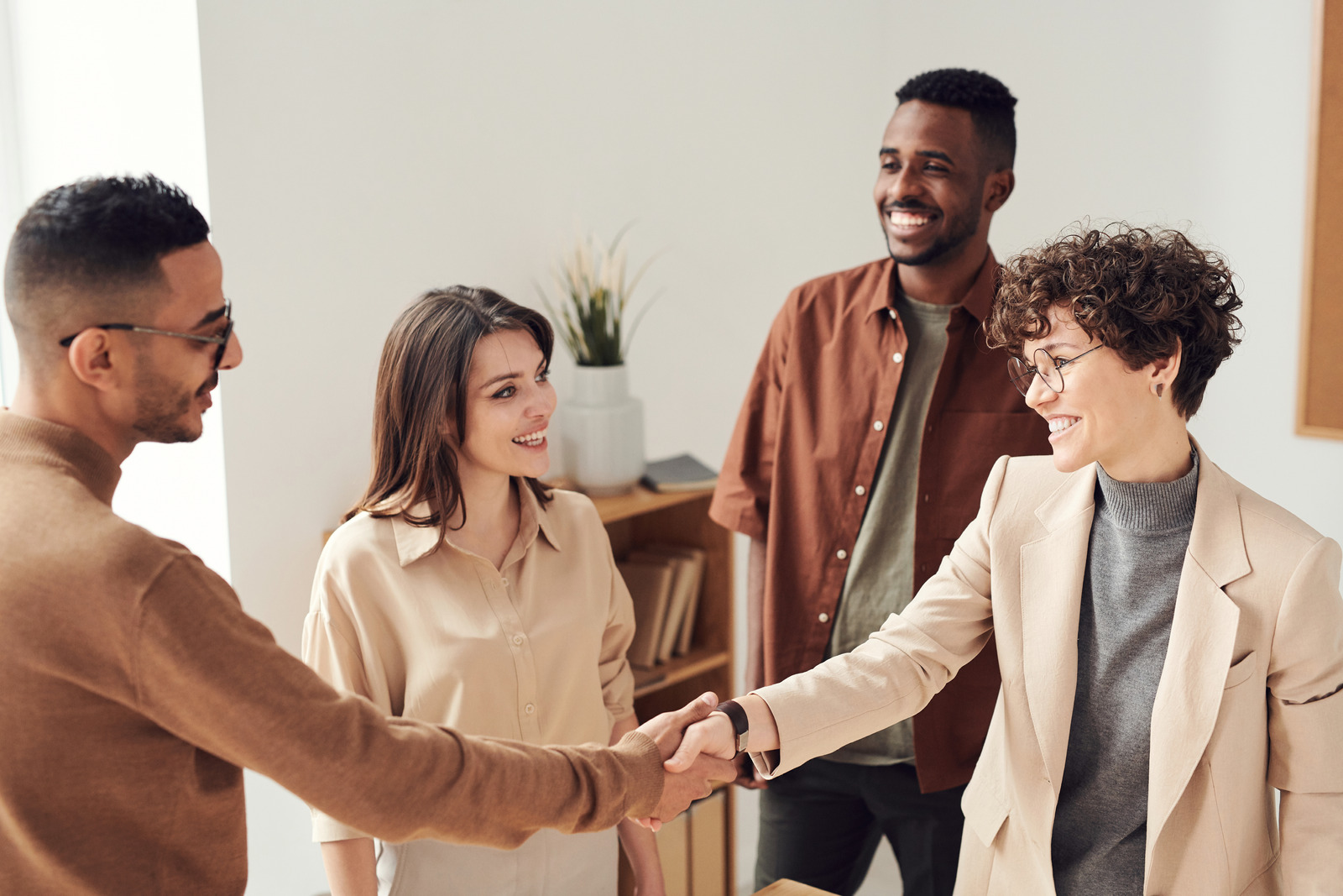 photo of people shaking hands