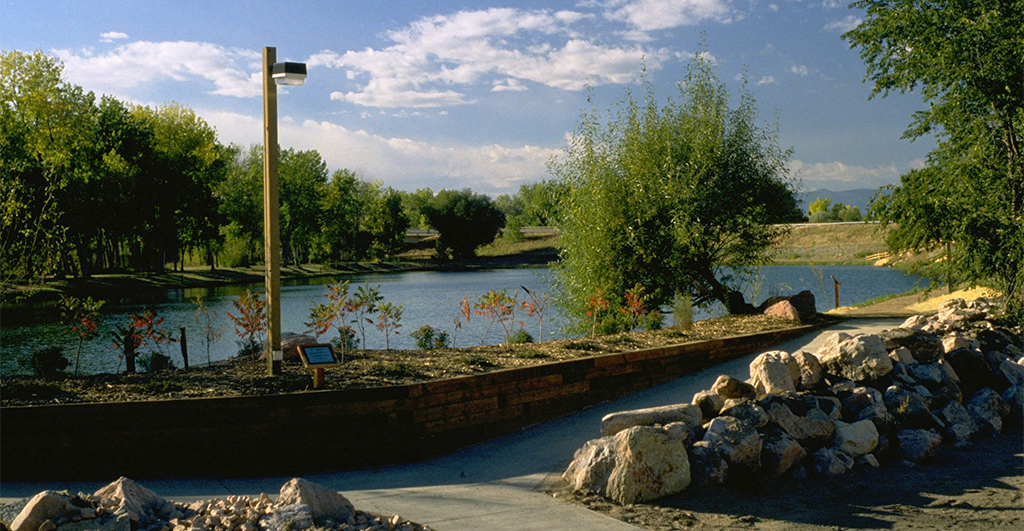 Willow Springs Pond header Willlow Springs Ponds with sidewalk trail and light.